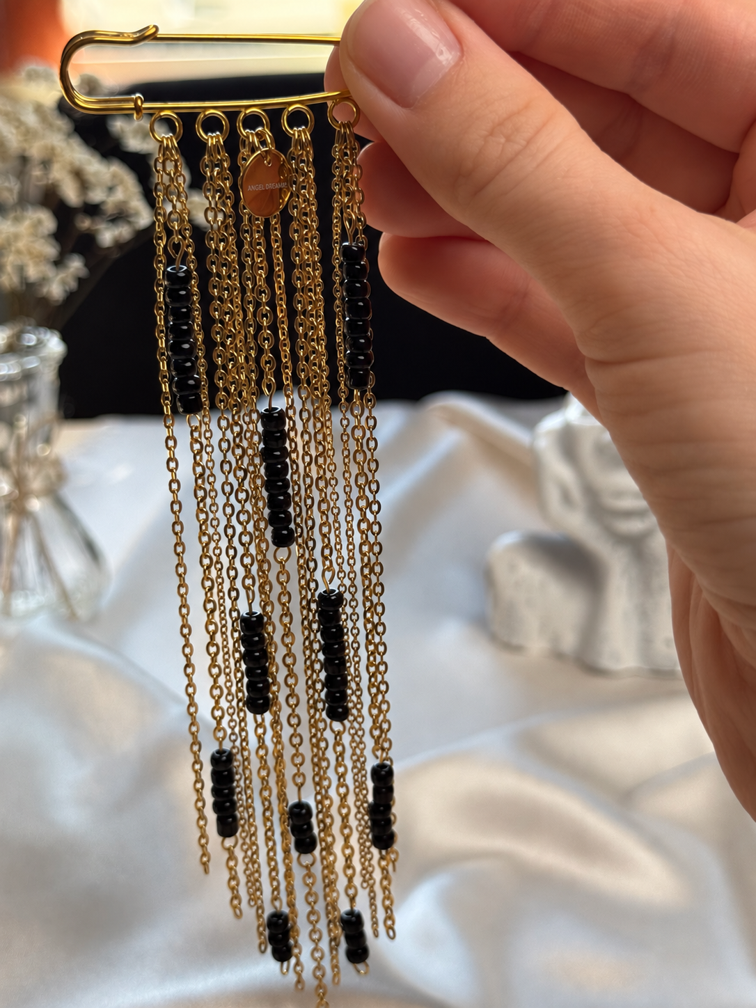 Gold-Tone Chain Brooch with Black Beads