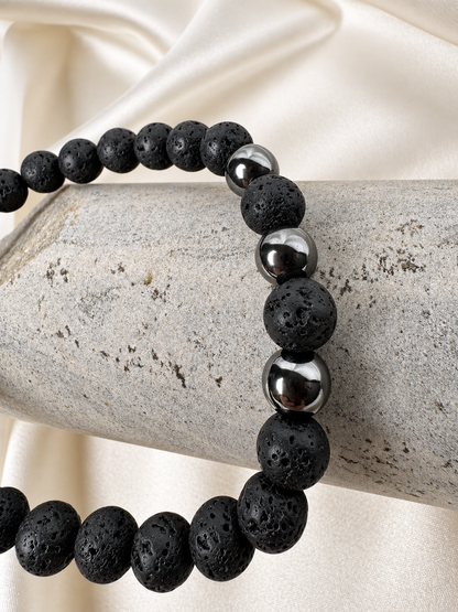 A handmade bracelet featuring textured lava stone and polished hematite accents. A minimalist design for everyday wear, perfect worn alone or stacked with other bracelets.

Stone size: 8 mm
Bracelet size: approximately 20 cm