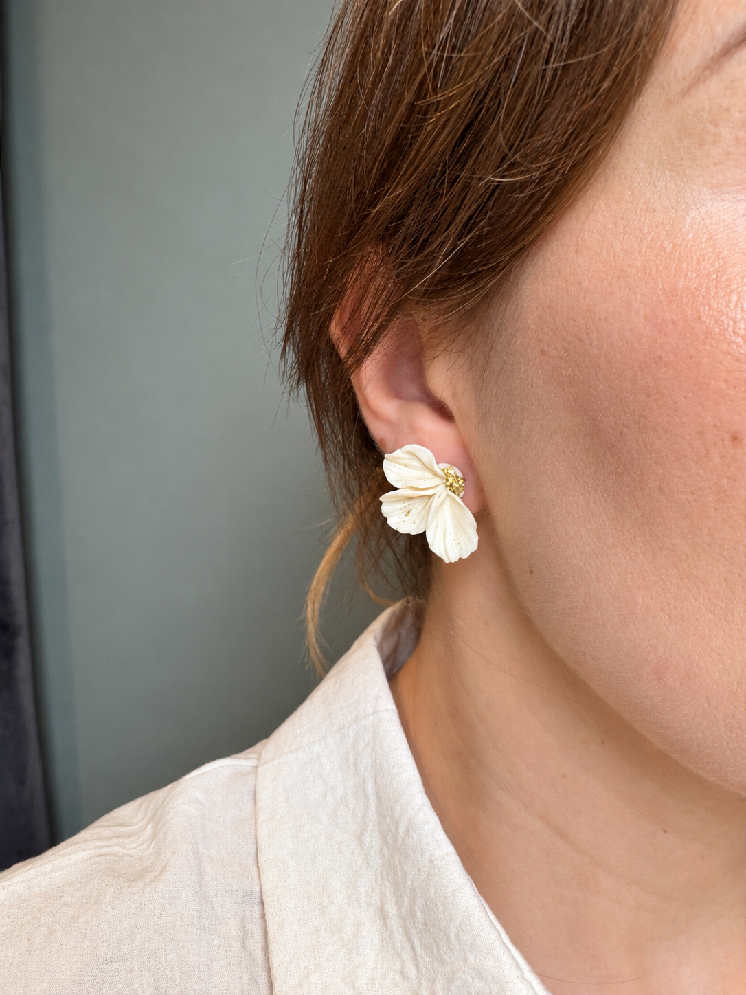 Handcrafted polymer clay earrings with softly sculpted, fan-shaped petals and delicate gold-tone accents. Their textured folds and gentle sheen create a romantic, elegant look for everyday wear or special occasions.

Available in a selection of soft shades — choose your favourite colour.

• Material: Polymer clay
• Details: Gold-tone accents
• Size: Approximately 2.5 cm

Each pair is shaped and decorated by hand, so slight variations in colour, texture and detailing make